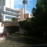 I took this photo from a pedestrian bridge on the River Walk. The Tower of the Americas is in the background.